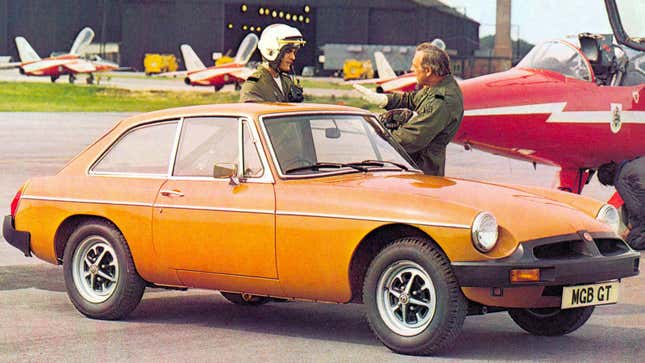 A yellow MGB sports car 