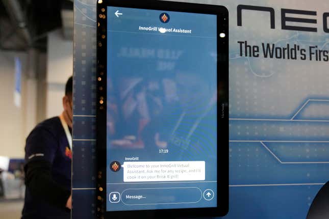 The InnoGrill Virtual Assistant AI is displayed next to the NeoSear smart grill by BriskIt during the CES tech show Wednesday, Jan. 10, 2024, in Las Vegas. (AP Photo/Ryan Sun)