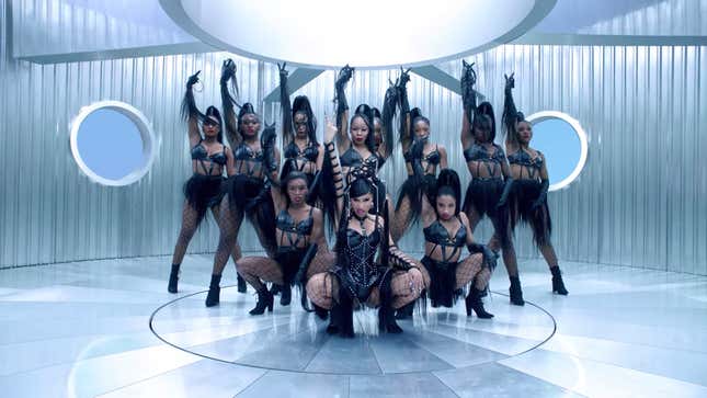 Image for article titled Cardi B Using a White Man As a Table, and Other Important Moments from the 'Up' Video