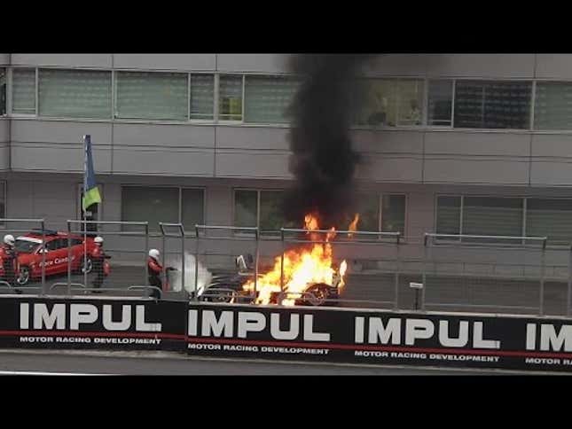 Lotus Prototype Drives Into Pit Lane On Fire