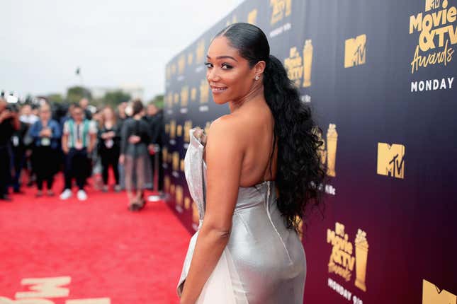 Host Tiffany Haddish attends the 2018 MTV Movie And TV Awards at Barker Hangar on June 16 in Santa Monica, California.