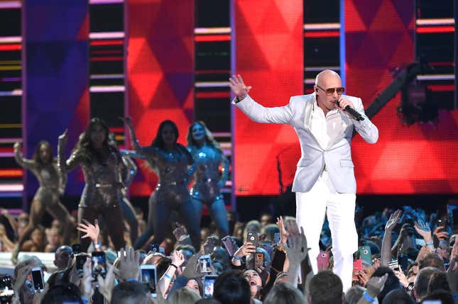 Pitbull at the 2016 CMT Awards, via Getty