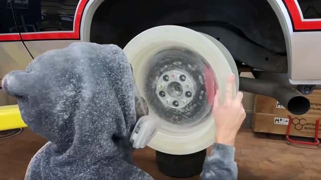 Image for article titled Watch This Guy&#39;s Homemade Epoxy Wheel Survive An Incredible Driveway Burnout