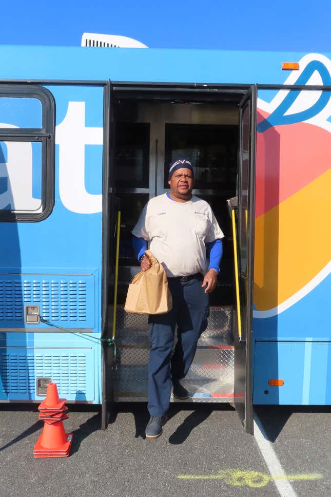 A customer steps off a specially modified bus that serves as a mobile supermarket in Atlantic City N.J. on Friday, Dec. 8, 2023. Virtua Health and the New Jersey Economic Development Authority are operating a service to bring fresh groceries and produce to Atlantic City, where plans for what would be the city&#39;s first supermarket in nearly 20 years recently fell through. (AP Photo/Wayne Parry)