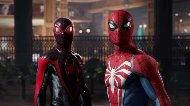 Spider-Mans Peter Parker and Miles Morales look at something menacing behind them. 