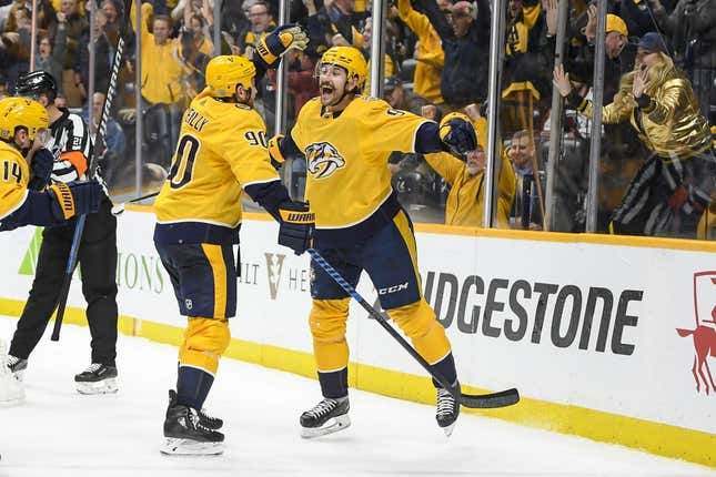 Nov 20, 2023; Nashville, Tennessee, USA; Nashville Predators left wing Filip Forsberg (9) celebrates as he scores the timing goal late against the Colorado Avalanche during the third period at Bridgestone Arena.