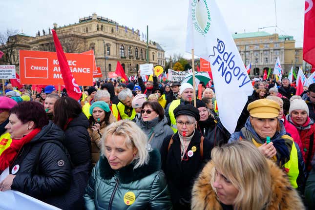 Thousands of protesters march downtown Prague, Czech Republic, Monday, Nov. 27, 2023. On Monday labor unions staged a day of protests and strikes across the Czech Republic to voice their opposition to the government&#39;s package of cuts and austerity measures meant to keep the ballooning deficit under control. (AP Photo/Petr David Josek)