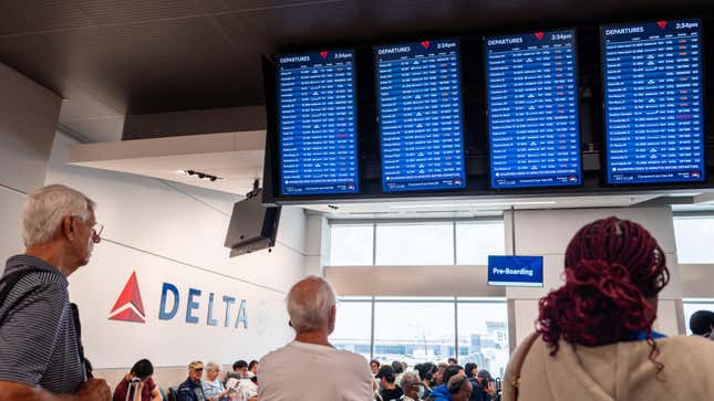 Delta passengers waiting for their flights