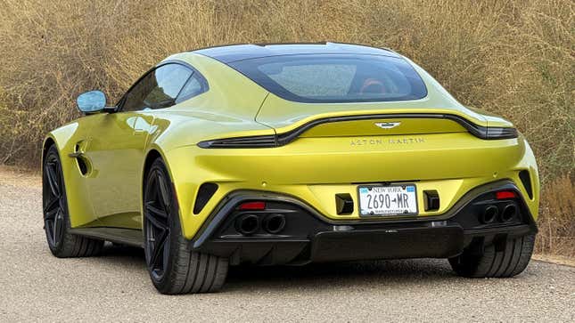 Rear 3/4 view of a yellow 2025 Aston Martin Vantage