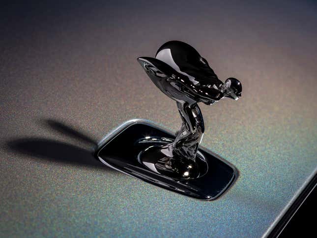 Spirit of Ecstasy hood ornament of the rainbow Rolls-Royce Spectre Lunaflair