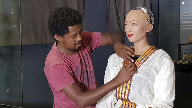 Getnet Assefa, Founder, iCog Labs and a Quartz Africa Innovator 2019, with humanoid robot Sophia at the Ethiopian National Museum in Addis Ababa.