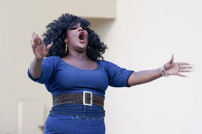 FILE - Drag queen Angelica Sanchez performs in front of hundreds of people, including immigrants-rights and abortion-rights groups and members of the LGBTQ+ community from across the state, as they take part in a rally and march, May 1, 2023, in Orlando, Fla. A panel of the 11th Circuit Court of Appeals on Wednesday, Oct. 11, 2023, said a ruling prohibiting the enforcement of a new Florida law targeting drag shows will stay in place for the time being, according to a federal appeals court decision. (AP Photo/John Raoux, File)