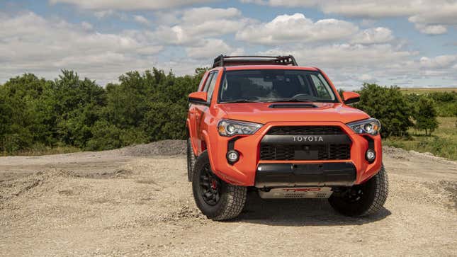 A photo of an orange Toyota 4Runner SUV. 