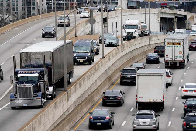 FILE - Motor vehicle traffic moves along the Interstate 76 highway in Philadelphia, March 31, 2021. The EPA on Friday, March 29, 2024, set new greenhouse gas emissions standards for heavy-duty trucks, buses and other large vehicles, an action that officials said will clean up some of the nation&#39;s largest sources of planet-warming pollution. (AP Photo/Matt Rourke, File)