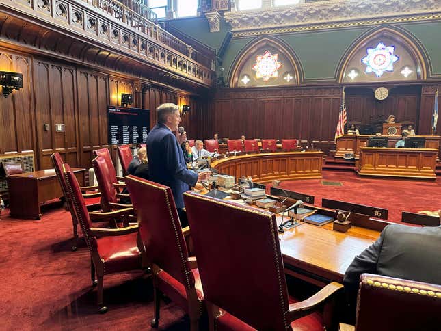 Democratic state Sen. James Maroney of Connecticut explains a far-reaching bill that attempts to regulate artificial intelligence during a debate in the state Senate in Hartford, Conn. on Wednesday, April 24, 2024. The bill marks one of the first major legislative proposals in the country to reign in bias in AI decision-making and protect people from harm. (AP Photo/Susan Haigh)