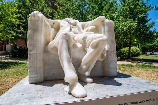 A wax replica of the Lincoln Memorial statue melts during a vigor   question    successful  Washington, DC, connected  June 24, 2024. 