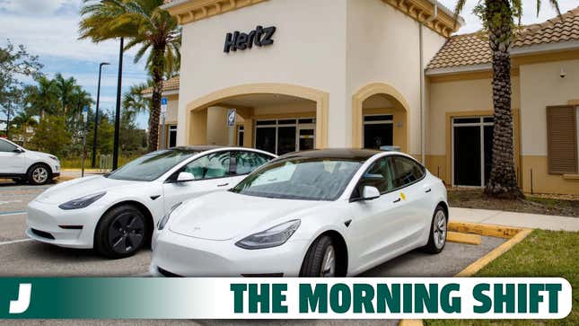 A photo of two Tesla cars at a Hertz office. 