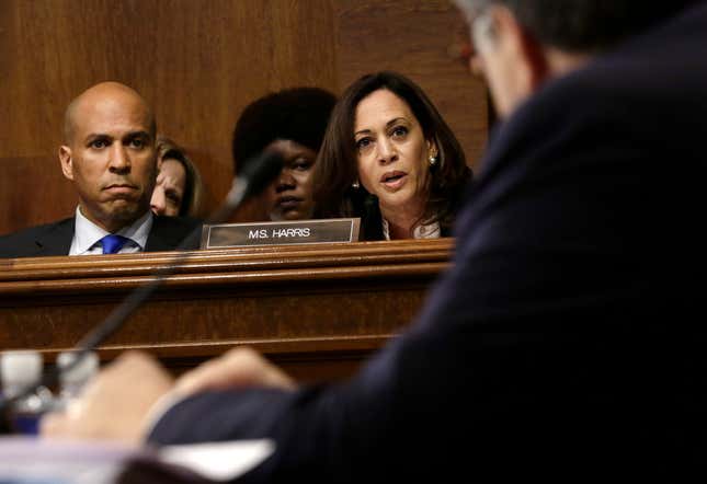 Sen. Kamala Harris (D-CA) speaks and Sen. Cory Booker (D-NJ) listens as U.S. Attorney General William Barr testifies before the Senate Judiciary Committee May 1, 2019 in Washington, DC. Barr testified on the Justice Department’s investigation of Russian interference with the 2016 presidential election. 