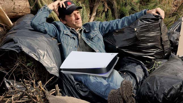 Mike Rowe ponders DRM with a PS5 in his lap. 