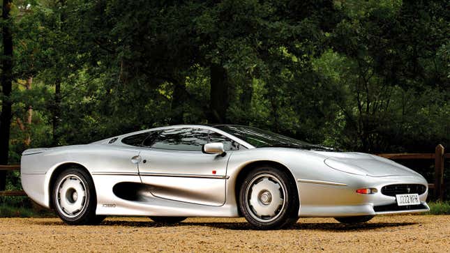 A photo of a silver Jaguar XJ220 sports car. 