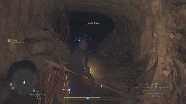 My Mystic Spearhand stands in front of the Putrid Cave entrance in Dragon's Dogma 2.