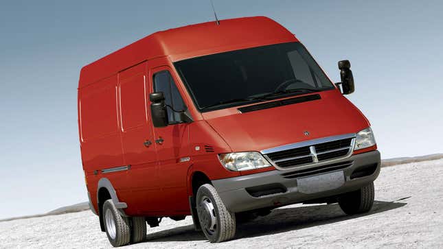 A photo of a red Dodge Sprinter van. 