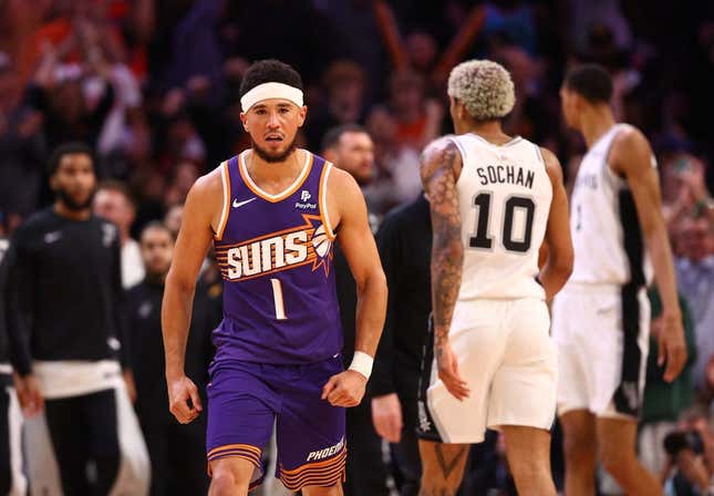 Nov 2, 2023; Phoenix, Arizona, USA; Phoenix Suns guard Devin Booker (1) celebrates a shot against the San Antonio Spurs in the second half at Footprint Center.