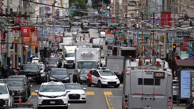 A Cruise robotaxi in SF traffic