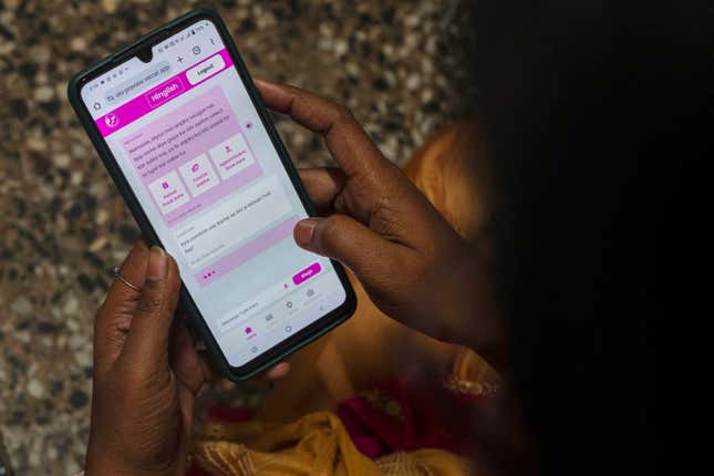 A woman learns to use a chatbot powered by artificial intelligence developed by Myna Mahila Foundation at the local women&#39;s organization’s office in Mumbai, India, Feb. 1, 2024. The chatbot, currently a pilot project, represents what many hope will be part of the impact of AI on health care around the globe: to deliver accurate medical information in personalized responses that can reach many more people than in-person clinics or trained medical workers. (AP Photo/Rafiq Maqbool)