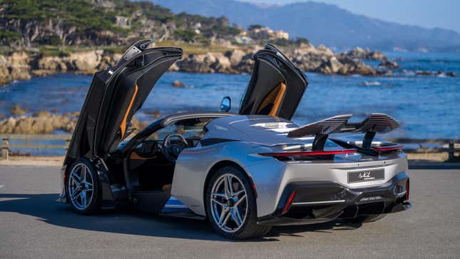 Rear 3/4 view of a silver Automobili Pininfarina Battista Targamerica