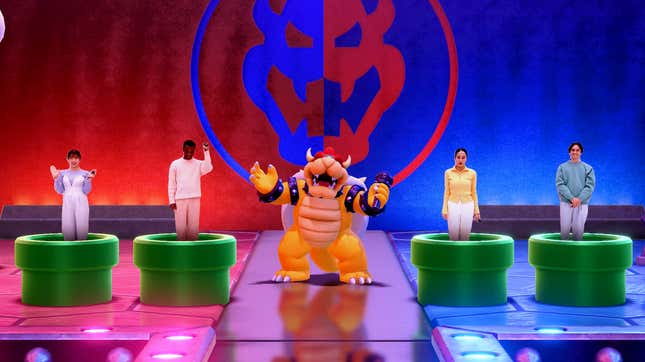 Bowser laughs as contestants stand on pipes.