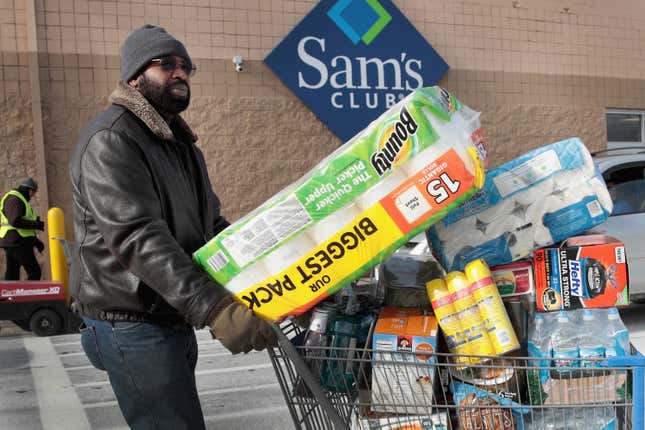 A shopper stocks up on merchandise at a Sam’s Club in Streamwood, Illinois.