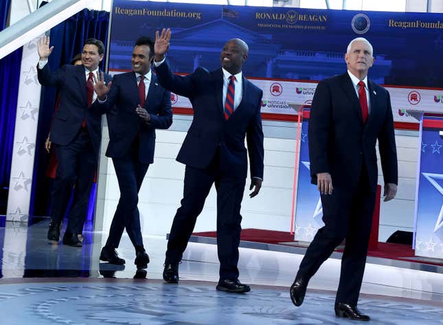 SIMI VALLEY, CALIFORNIA - SEPTEMBER 27: Republican presidential candidates (L-R), Florida Gov. Ron DeSantis, Vivek Ramaswamy, U.S. Sen. Tim Scott (R-SC) and former U.S. Vice President Mike Pence walk on stage during the FOX Business Republican Primary Debate at the Ronald Reagan Presidential Library on September 27, 2023 in Simi Valley, California. Seven presidential hopefuls squared off in the second Republican primary debate as former U.S. President Donald Trump, currently facing indictments in four locations, declined again to participate. 