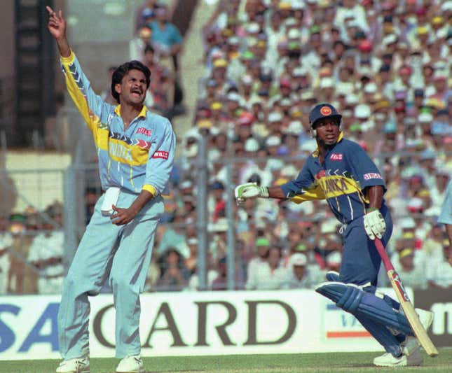 Javagal Srinath takes a wicket in a 1996 World Cup semi-final match against Sri Lanka.