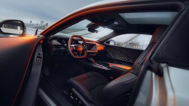 Door open showing the interior of a Dodge Charger Daytona EV
