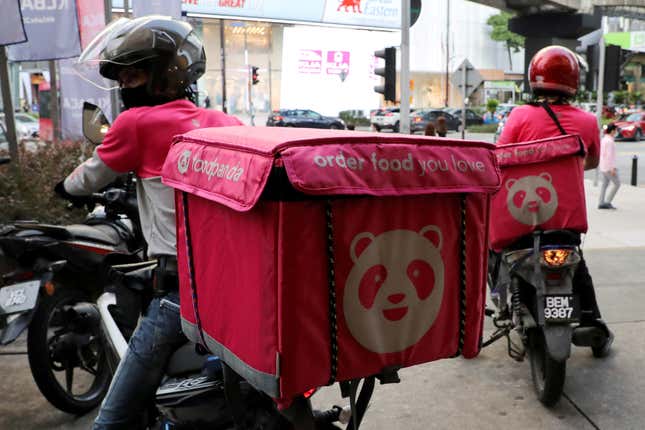 foodpanda delivery boxes on the back of two bikes