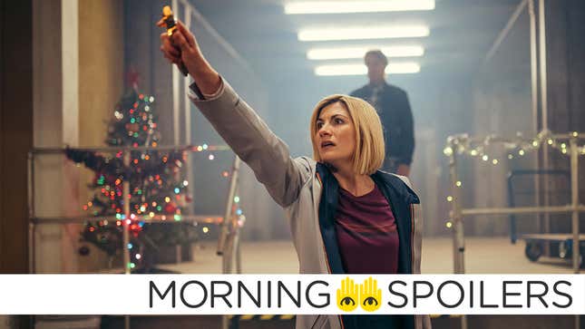 Jodie Whittaker's 13th Doctor holds her Sonic Screwdriver aloft as she explores a warehouse decorated with Christmas lights.