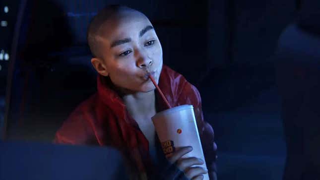 The main character of Intergalactic sips a drink through a straw. 