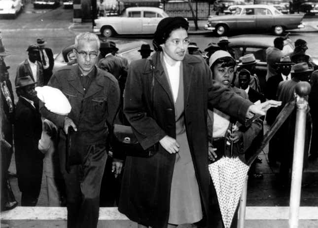 In this Feb. 24, 1956, file photo, Rosa Parks arrives at circuit court to be arraigned in the racial bus boycott in Montgomery, Ala.