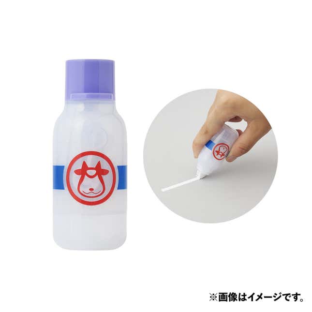 A white-out tape dispenser made to look like a bottle of Moomoo Milk.