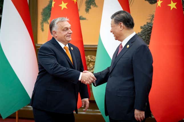 In this picture issued by the Hungarian PM&#39;s Press Office, Chinese President Xi Jinping, right, receives Hungarian Prime Minister Viktor Orban before their bilateral meeting in the Great Hall of the People in Beijing, China, Tuesday, Oct. 17, 2023. (Zoltan Fischer/Hungarian PM&#39;s Press Office/MTI via AP)