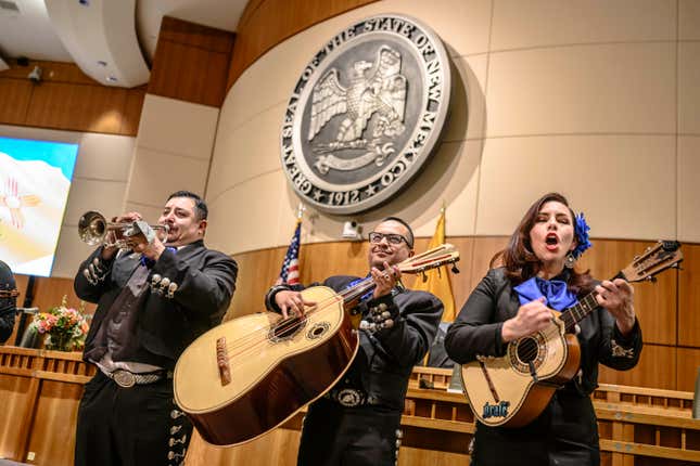 The Mariachi group called Euforia entertain lawmakers prior to the start of the 56th Legislature at the Capitol, Tuesday, Jan. 16, 2024, in Santa Fe, N.M. Pictured from left to right are members Lorenzo Lujan, Joseph Varela, and Megan Pacheco. (AP Photo/Roberto E. Rosales)