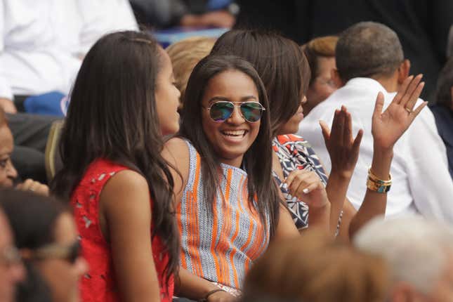 HAVANA, CUBA - MARCH 22: (L-R) Malia Obama, Sasha Obama, U.S. first lady Michelle Obama and President Barack Obama react to the first run scored during an exhibition game between the Cuban national baseball team and Major League Baseball’s Tampa Bay Devil Rays at the Estado Latinoamericano March 22, 2016 in Havana, Cuba.