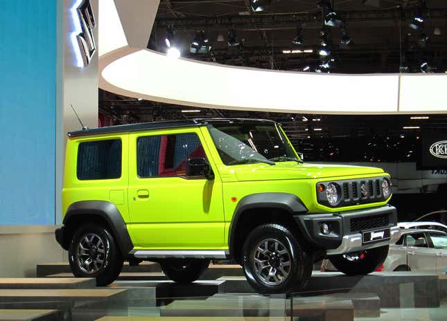 A green Suzuki Jimny.