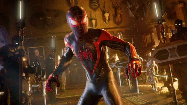 A person in a Spider-Man suit stands in a building.