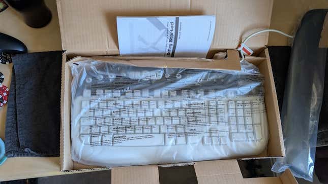 A new keyboard in its cardboard box.