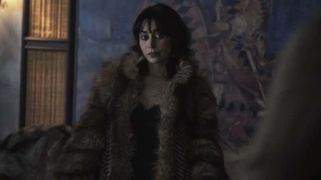 Sofia Falcone wears a fur coat. 