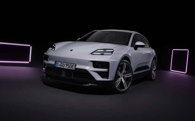 Front 3/4 view of a white 2024 Porsche Macan EV