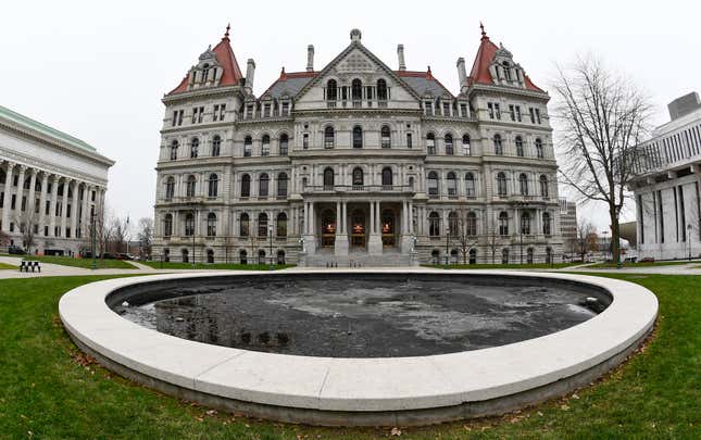 FILE - The New York Capitol is seen, Dec. 14, 2020, in Albany, N.Y. New York Gov. Kathy Hochul, on Monday, April 15, 2024, announced the framework of a $237 billion budget that includes broad plans to to drive new housing construction, address the influx of migrants and crack down on illegal marijuana shops. (AP Photo/Hans Pennink, File)