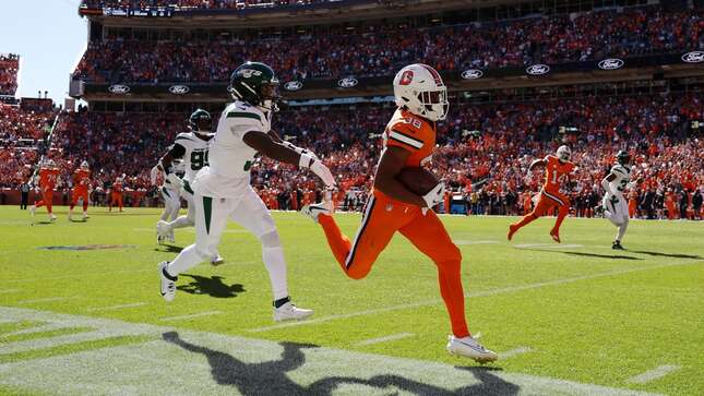 DENVER, COLORADO - OCTOBER 08: Jaleel McLaughlin #38 of the Denver Broncos runs with the ball while being chased by Jordan Whitehead #3 of the New York Jets in the first quarter at Empower Field At Mile High on October 08, 2023 in Denver, Colorado. (Photo by Matthew Stockman/Getty Images)